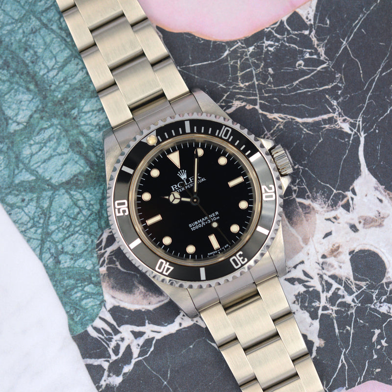 1997 Rolex Oyster Perpetual Submariner 14060 with papers