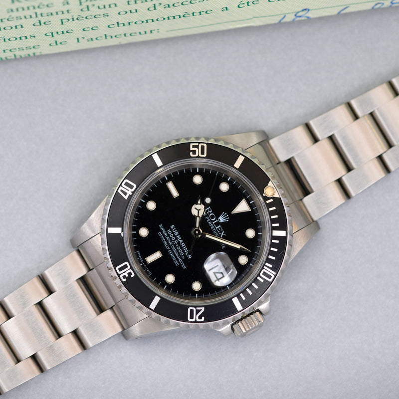 1991 Rolex Oyster Perpetual Submariner Date 16610 with papers